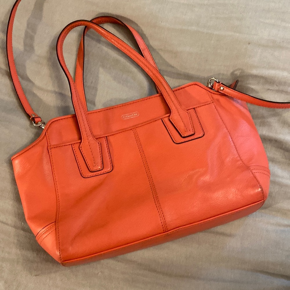 COACH Pink/ coral colored handbag with crossbody strap